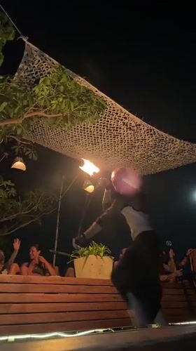 Fire dancers perform nighttime show in Ban Haad Rin Thailand