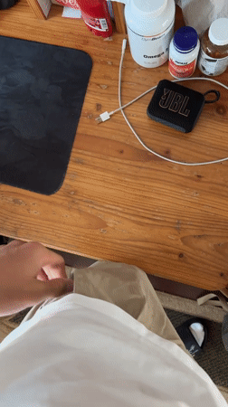 Person gathers keys, electronics from desk in Zlatograd