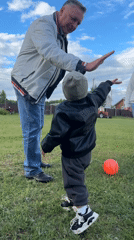 Family enjoys afternoon playtime in rural Russian village