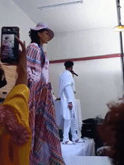 Fashion show features runway model with live musical performance