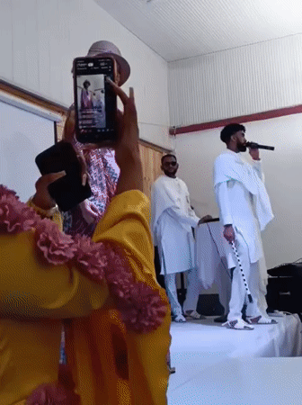 Fashion show features runway model with live musical performance