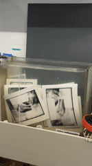 Film photography darkroom session documented in Milan