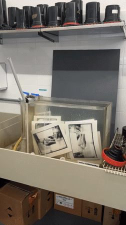Film photography darkroom session documented in Milan