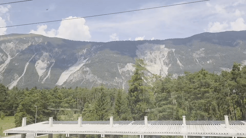 Sweeping mountain views from road, rail, and open ground