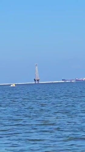 Busy coastal waters off Denpasar on a clear Bali morning