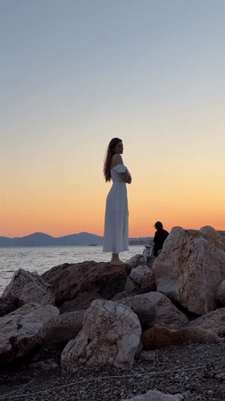 Sunset photo shoot on the rocky shore of Paleo Faliro