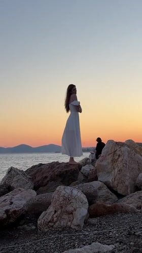 Sunset photo shoot on the rocky shore of Paleo Faliro