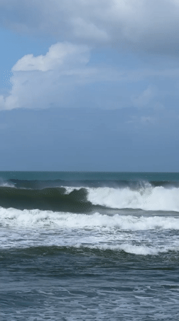 Poolside and ocean views at a Goviyapana coastal property