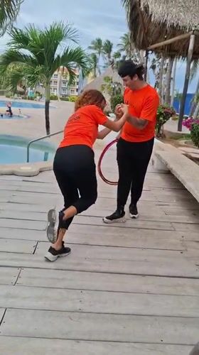 Evening recreation and entertainment observed at Venezuelan beach resort