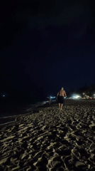 Nighttime beach walker with walking stick observed in Thailand