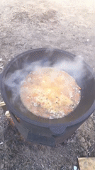 Cooking pot with rice and vegetables filmed in Nizhnevartovsk