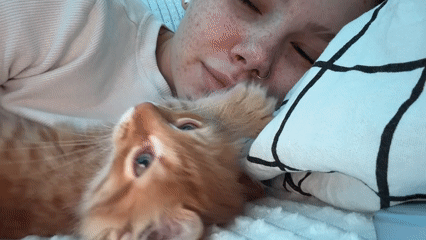 Woman rests peacefully on bed in Khimki