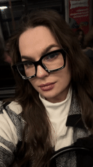 Woman in plaid jacket spotted on Moscow subway