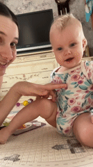 Mother and baby playtime documented in Pokrov home