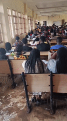 Students attend class session in Awka classroom