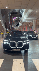 Luxury cars gather at Dubai airport pickup area