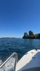 Clear water and a small island off Spartochori, Greece