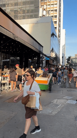 Street vendors operate outdoor market in São Paulo city center