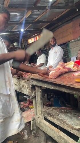 Meat market operations documented in Ado, Nigeria