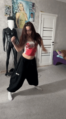Woman breakdances in bedroom, startles herself laughing in Abakan
