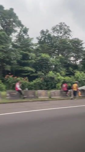 Truck overturns on road in Sukaraja, Indonesia
