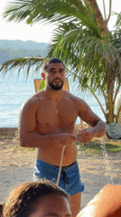 Beachgoer uses outdoor shower in General Luna, Philippines