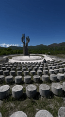 Visitors explore Montenegro's Barutana Memorial Park on sunny spring morning
