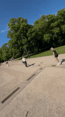 Tourist films selfie video at Royal Palace Oslo