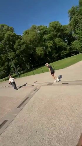Tourist films selfie video at Royal Palace Oslo