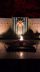 Nighttime scenes documented across Sochi showing memorial, cityscape, park