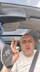 Man in white shirt observed in car, Huntingdonshire