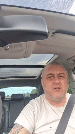 Man in white shirt observed in car, Huntingdonshire