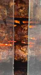 Food preparation and dining captured in Barcelona restaurant scene