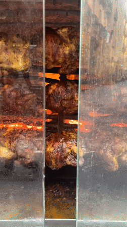 Food preparation and dining captured in Barcelona restaurant scene