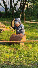 Family enjoys outdoor gathering with fire pit in Votkinsk