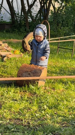 Family enjoys outdoor gathering with fire pit in Votkinsk