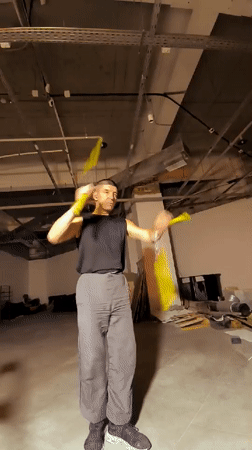 Nunchaku practice in a raw, unfinished Karaganda industrial space