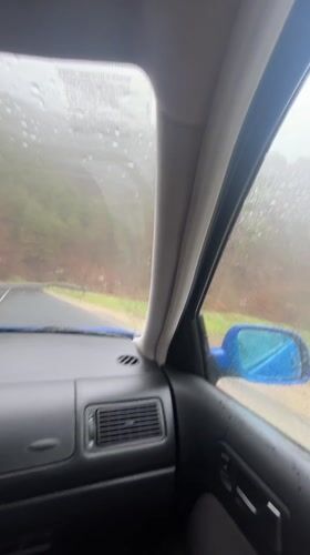 Rainy car journey through Bulgarian forest captured on video