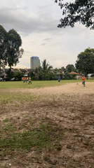 Soccer game played on grassy field in Subang Jaya