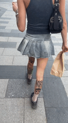 Woman with coffee spotted near Moscow landmark building