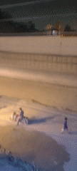 Cars drift on Quetta road, dust kicked up