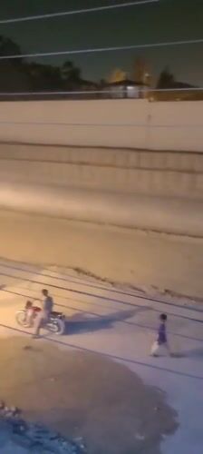 Cars drift on Quetta road, dust kicked up