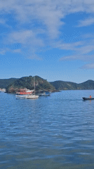 Boats anchored in bay at Armação dos Búzios