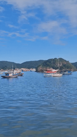 Boats anchored in bay at Armação dos Búzios
