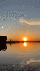 Spring evening life captured across Chaikovsky, Russia waterfront