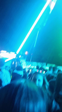 Illuminated carnival ride operates at Ruse fairground Friday evening