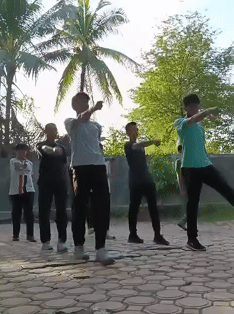 Community activities include group exercise and Arabic calligraphy painting