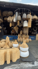 Traditional rattan crafts displayed at Ubud market stall