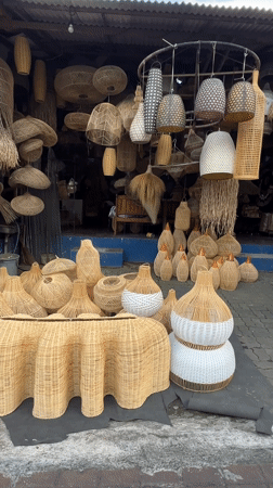 Traditional rattan crafts displayed at Ubud market stall