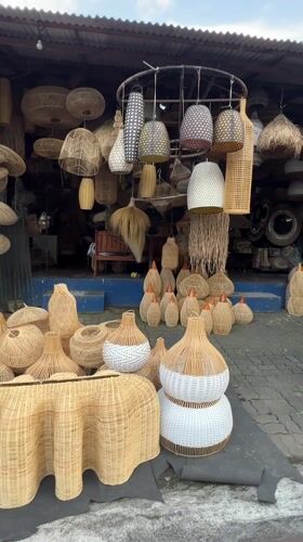 Traditional rattan crafts displayed at Ubud market stall